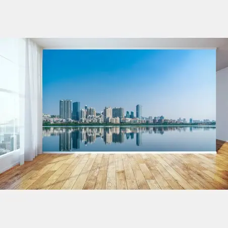 Wall mural calm city skyline reflection over water • Wallissimo®