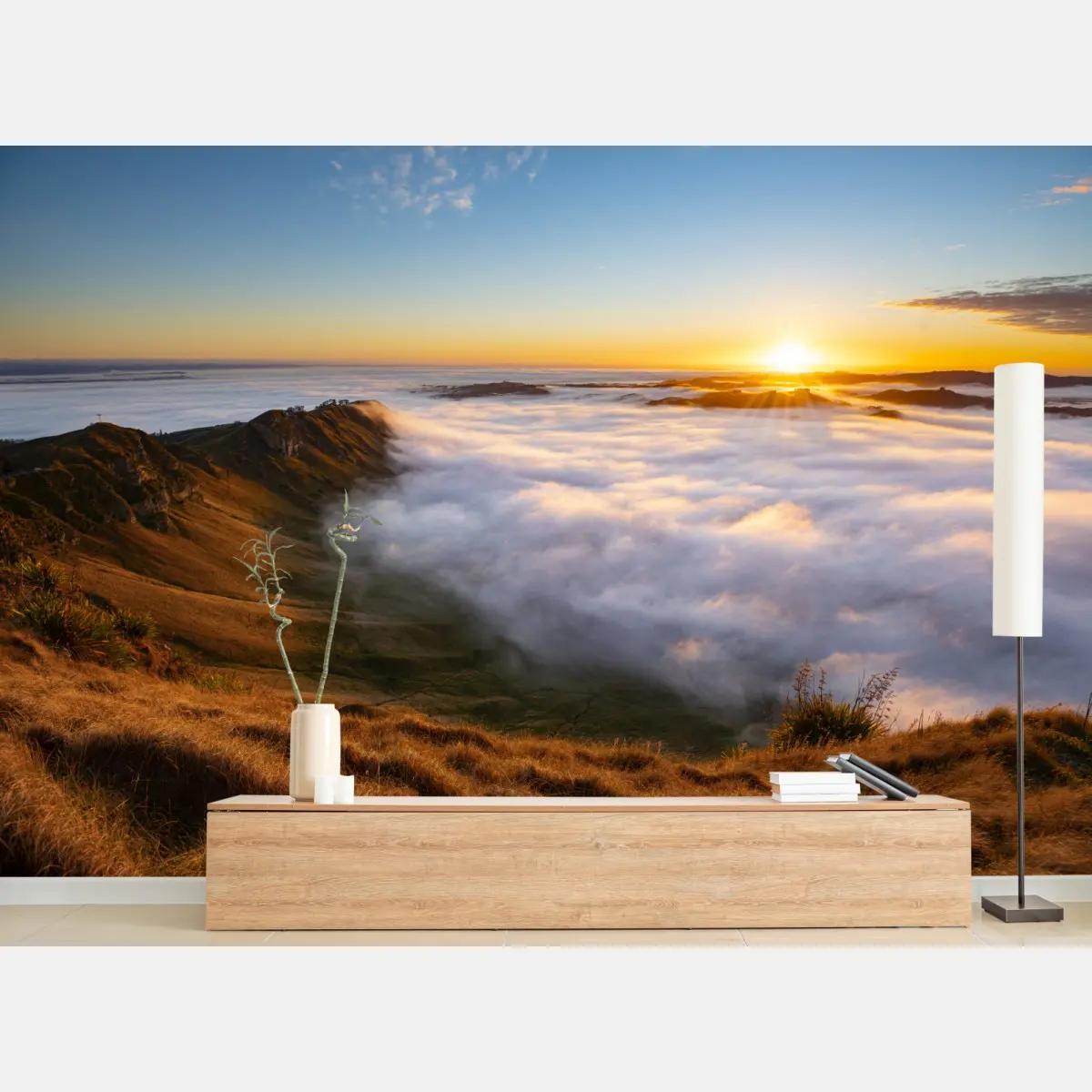 Wall mural sunrise over misty mountain valley • Wallissimo®