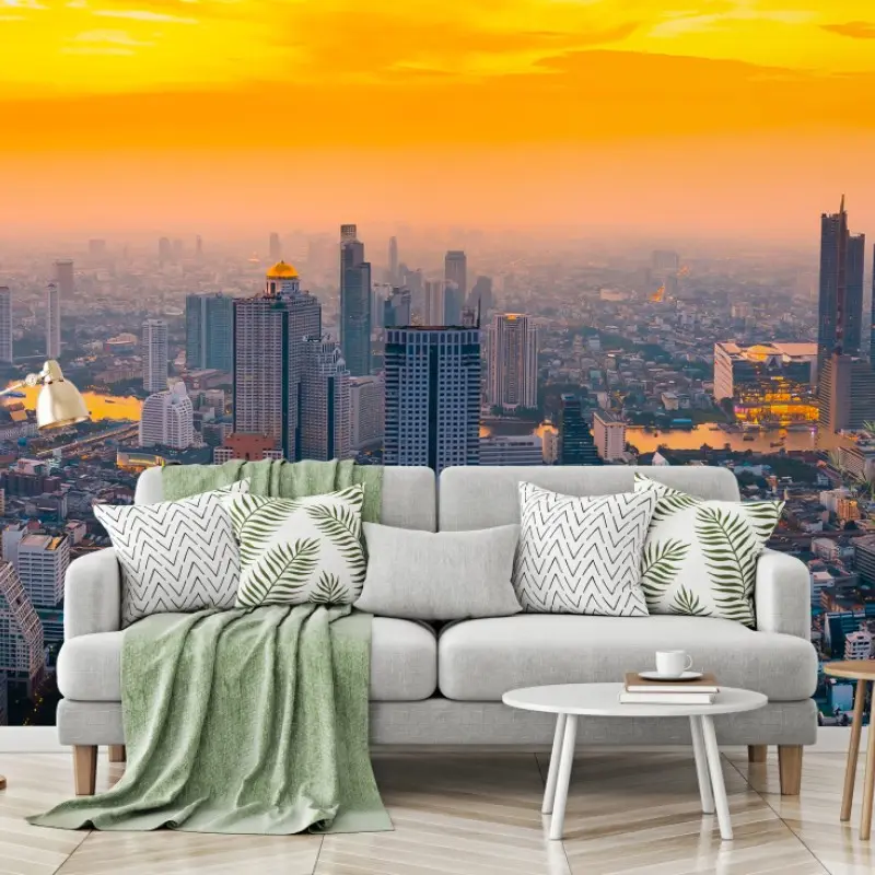 Wall mural golden city skyline at sunset