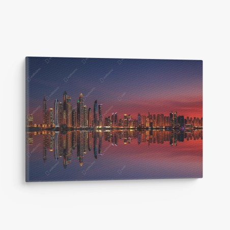 Canvas print city skyline at sunset with reflection • Wallissimo®