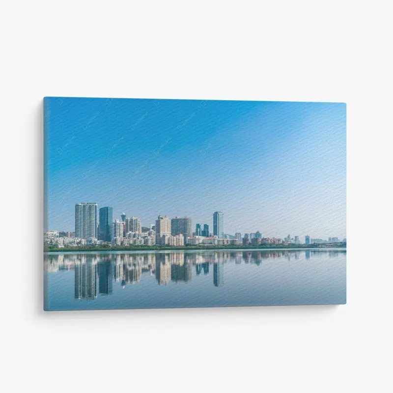 Canvas print calm city skyline reflection over water
