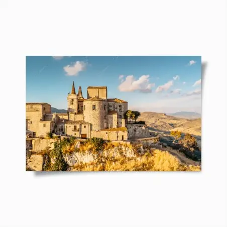 Poster sunlit hilltop village overlooking rolling hills • Wallissimo®