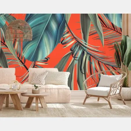 Wall mural tropical turquoise leaves on orange background • Wallissimo®