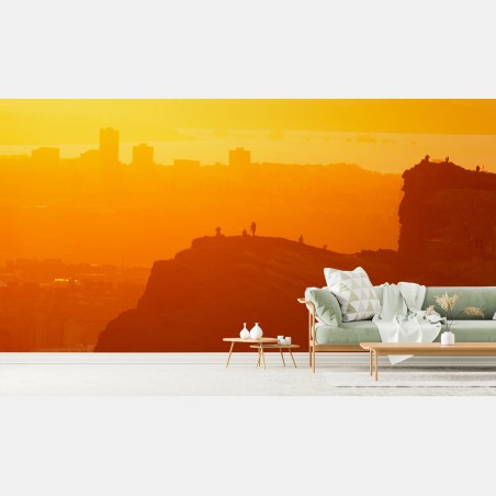 Wall mural golden sunset silhouette over cliffs • Wallissimo®