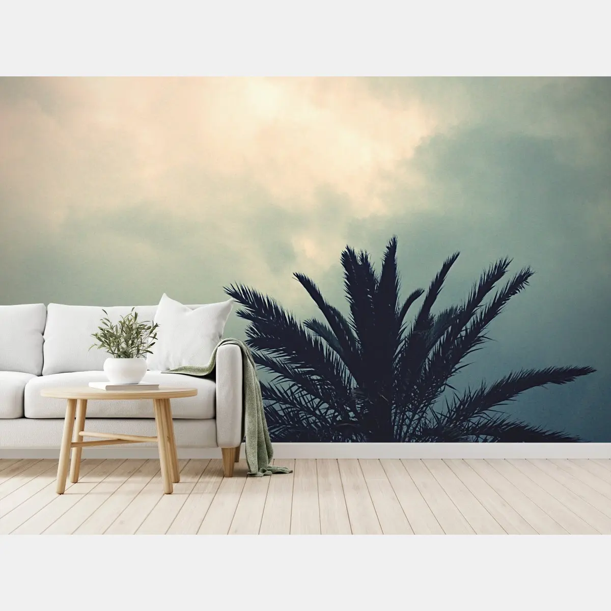 Wall mural moody palm silhouette against a cloudy sky • Wallissimo®