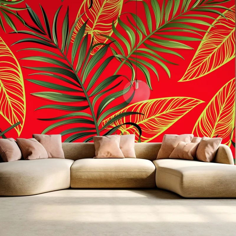 Wall mural tropical leaves pattern on red background