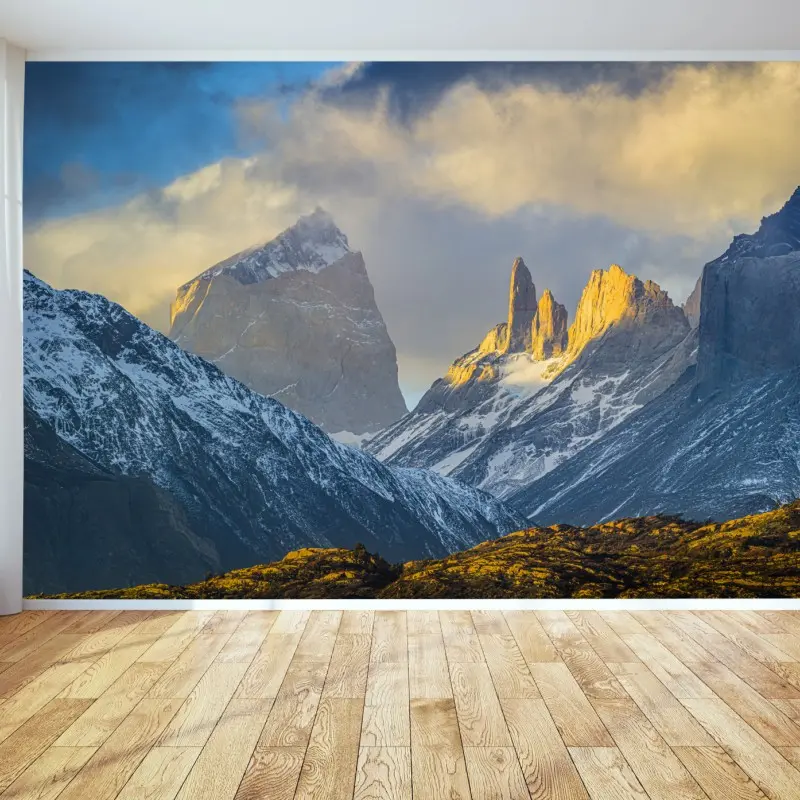 Wall mural golden sunrise over mountain peaks