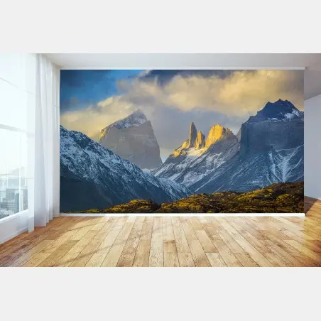 Wall mural golden sunrise over mountain peaks • Wallissimo®