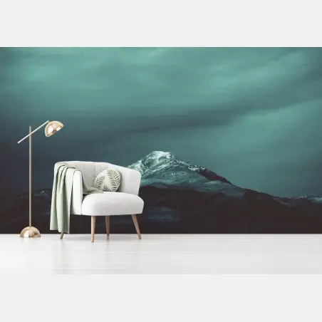 Wall mural turquoise mountain under a moody sky • Wallissimo®