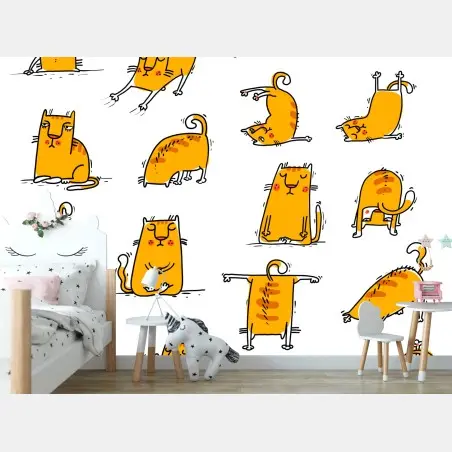 Wall mural playful orange cat poses • Wallissimo®