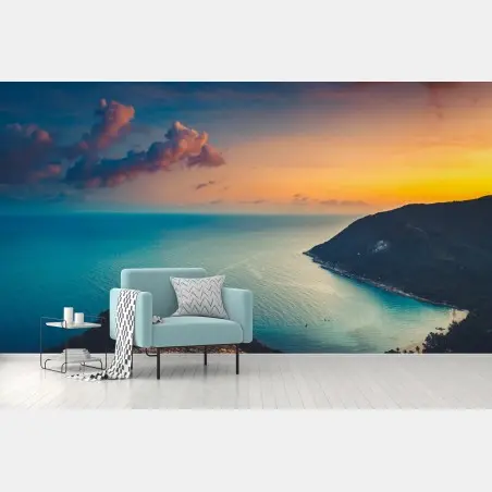 Wall mural sunset over a tropical bay • Wallissimo®
