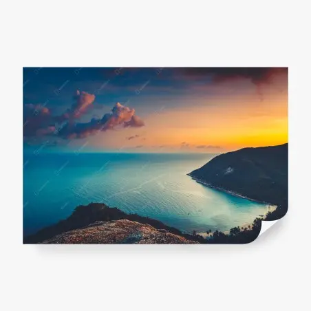 Wall mural sunset over a tropical bay • Wallissimo®