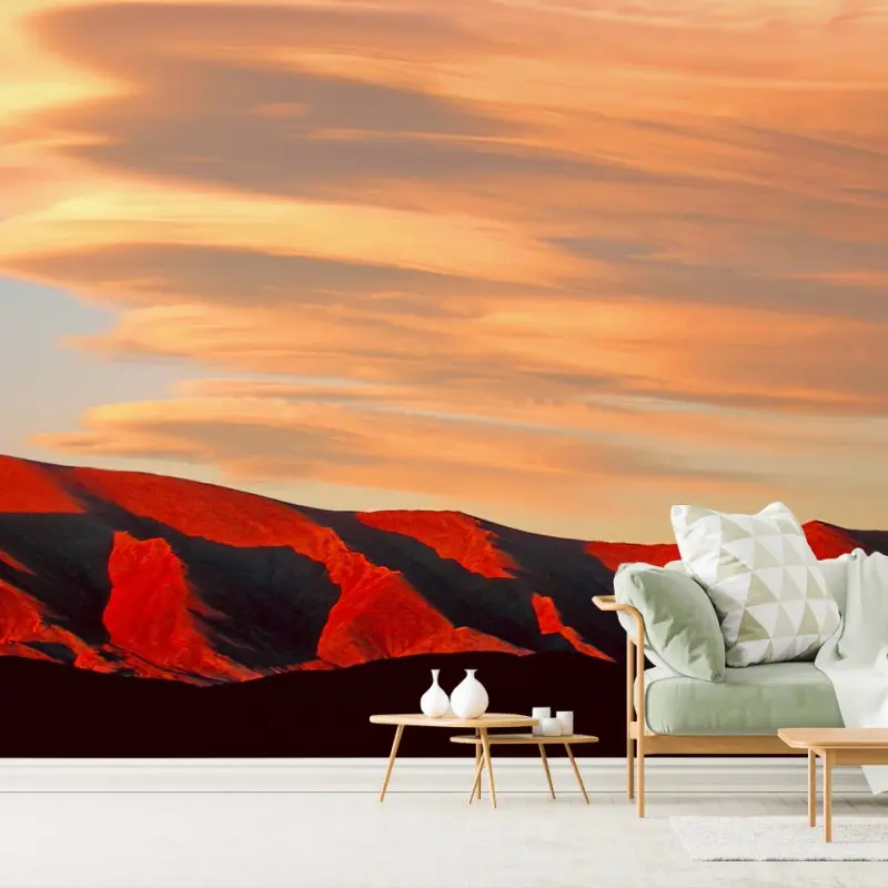 Wall mural golden sunset over crimson mountains