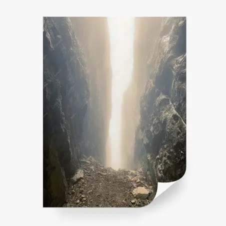 Wall mural sunlit narrow canyon between towering cliffs • Wallissimo®