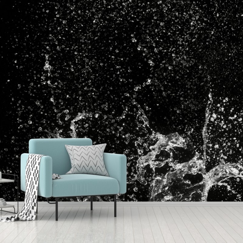 Wall mural dramatic water splash in motion