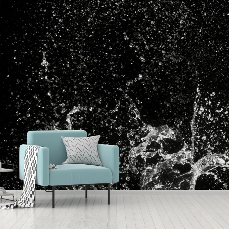 Wall mural dramatic water splash in motion