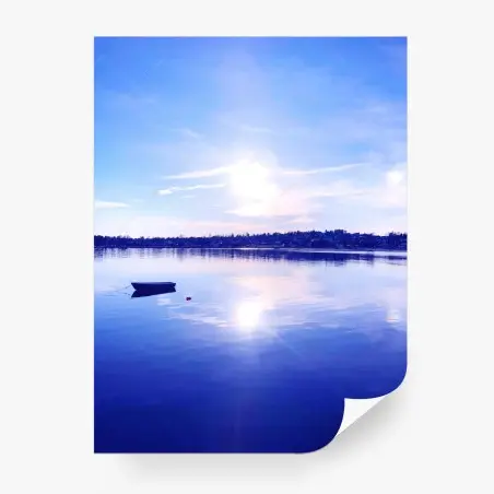 Wall mural tranquil blue lake with lone boat • Wallissimo®