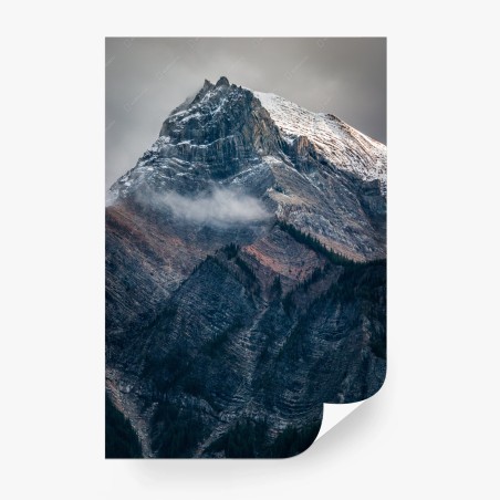 Wall mural dramatic alpine peak in mist • Wallissimo®