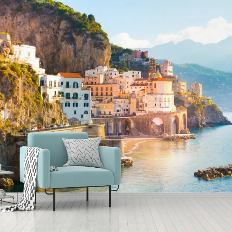 Wall mural sunlit coastal cliffside village