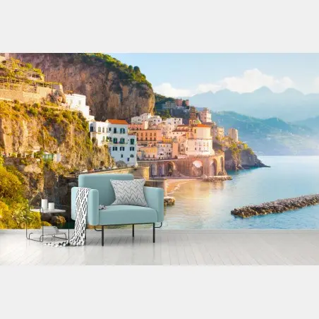 Wall mural sunlit coastal cliffside village • Wallissimo®