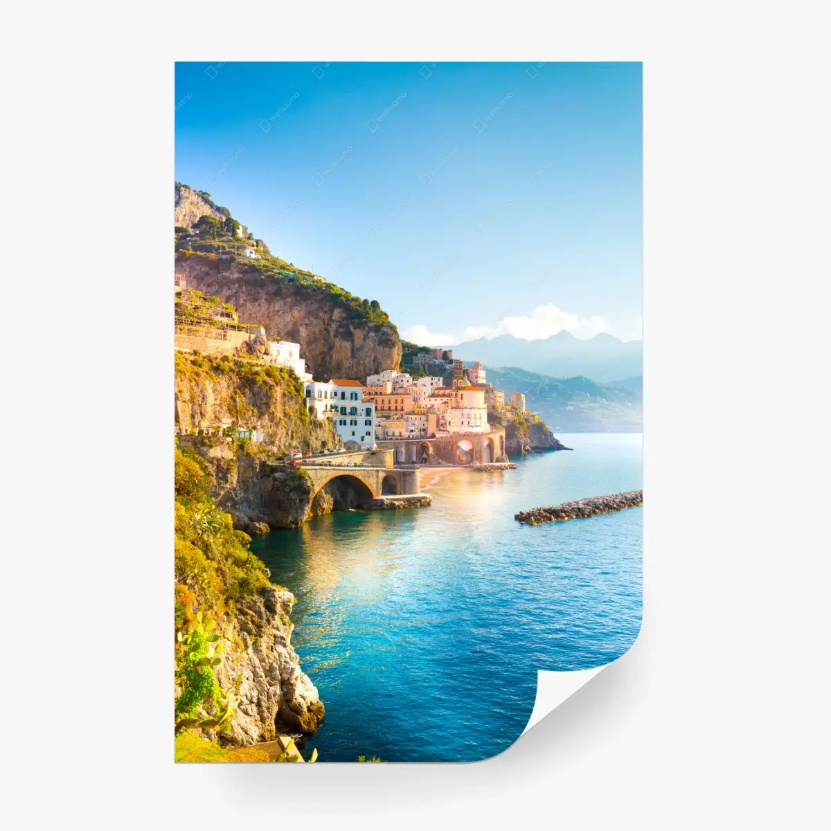 Wall mural sunlit coastal cliffside village • Wallissimo®
