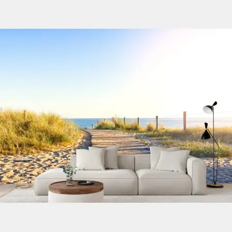 Wall mural sunlit boardwalk to the sea • Wallissimo®
