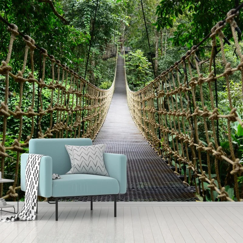 Wall mural suspended canopy bridge through lush forest