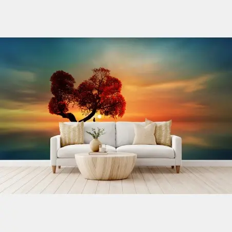 Wall mural solitary red tree at sunset • Wallissimo®