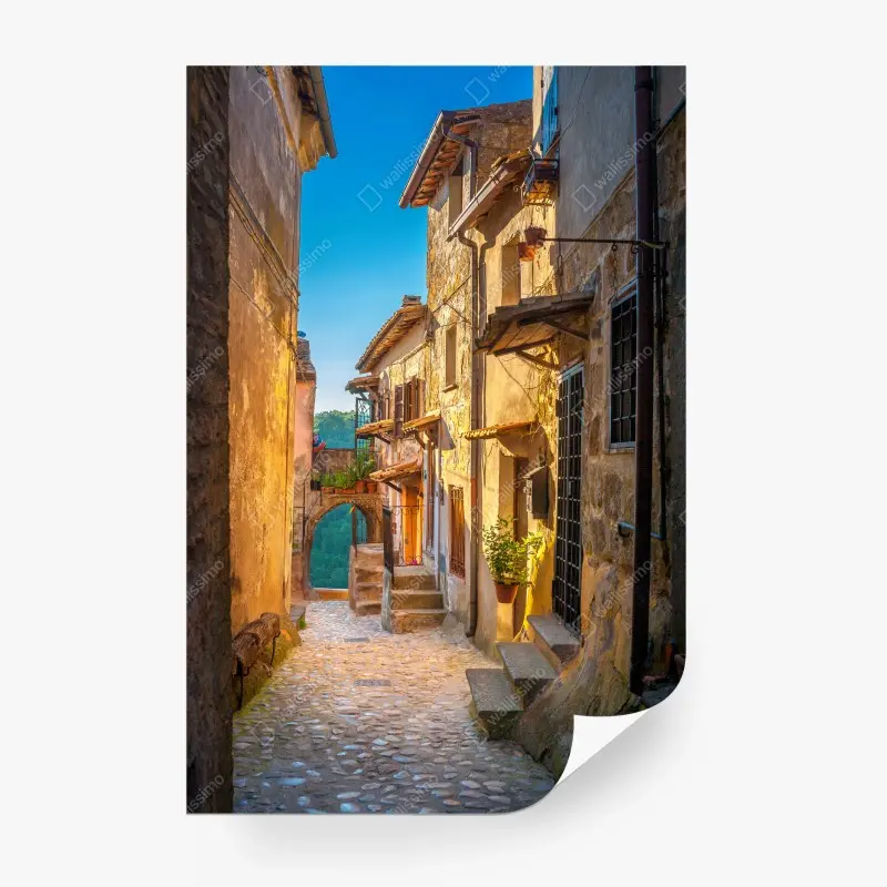Wall mural sunlit street in Tuscany