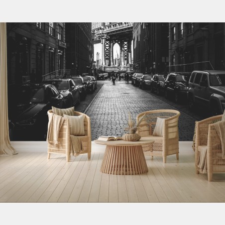 Wall mural Manhattan bridge framed by cobblestone street • Wallissimo®