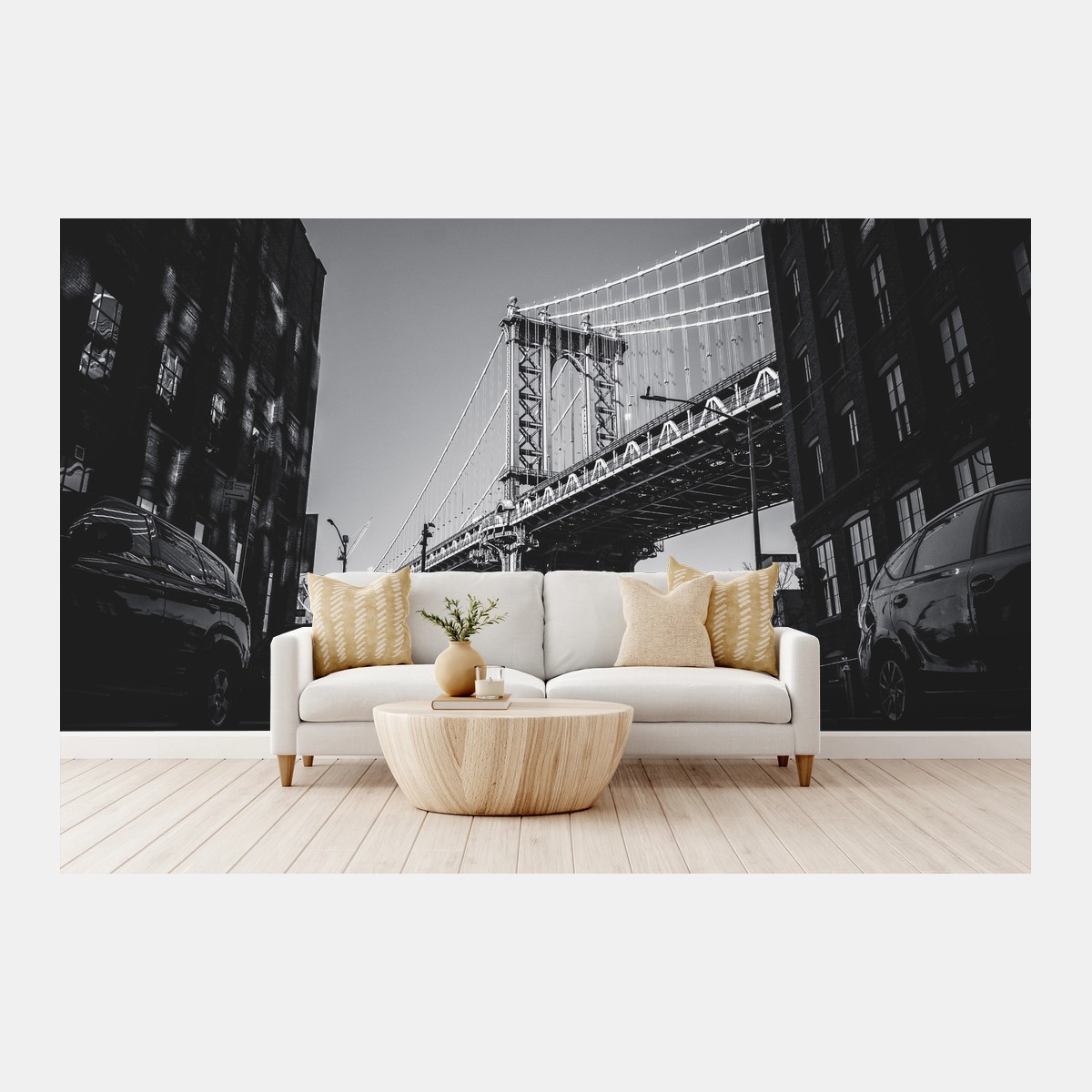 Wall mural Manhattan bridge perspective over cobblestone street • Wallissimo®