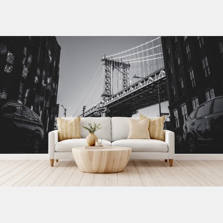Wall mural Manhattan bridge perspective over cobblestone street • Wallissimo®
