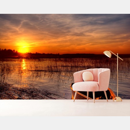 Wall mural sunset boat on a tranquil lake • Wallissimo®
