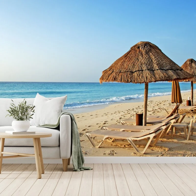 Wall mural tropical beach with straw umbrellas