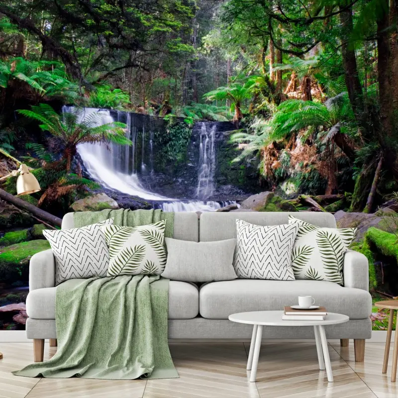 Wall mural moss-covered waterfall in lush forest