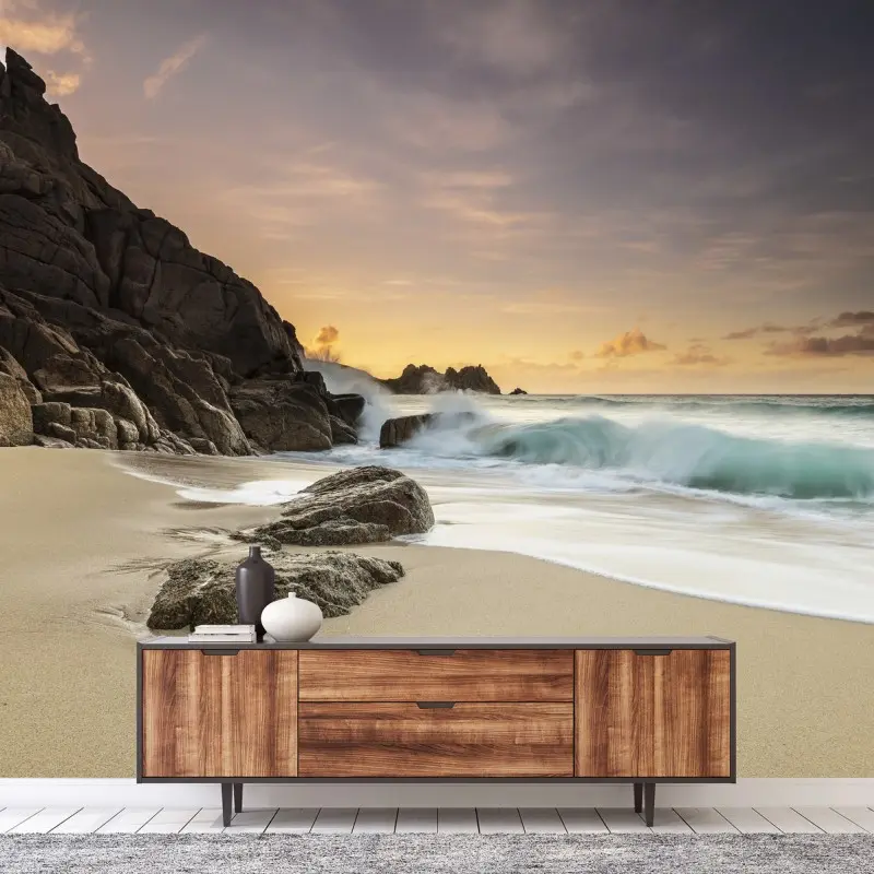 Wall mural serene rocky beach at sunset