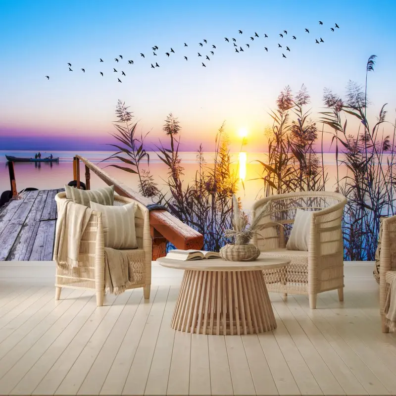 Wall mural serene sunrise over lakeside dock