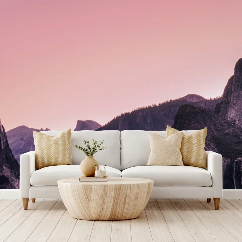 Wall mural pink dusk over mountain valley