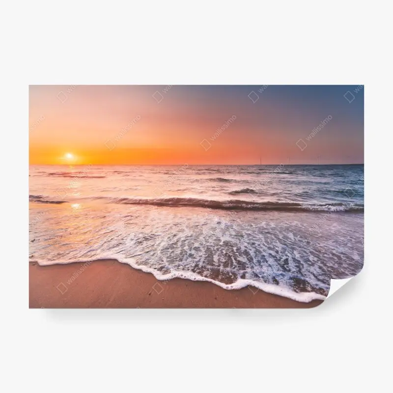 Wall mural sunset over Zeeland coastline