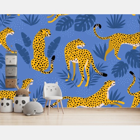 Wall mural playful cheetah pattern on blue background • Wallissimo®