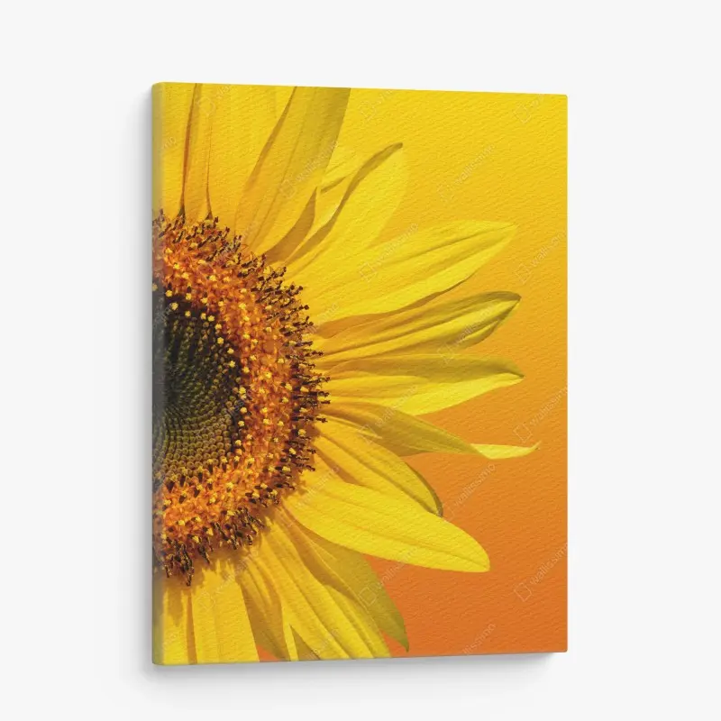 Canvas print bright sunflower close-up on yellow background