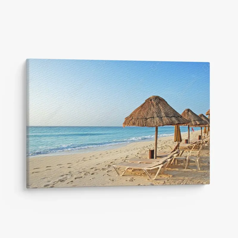 Canvas print tropical beach with straw umbrellas