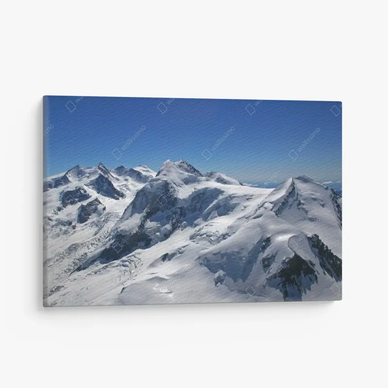 Canvas print snow-covered alpine peaks under clear blue sky