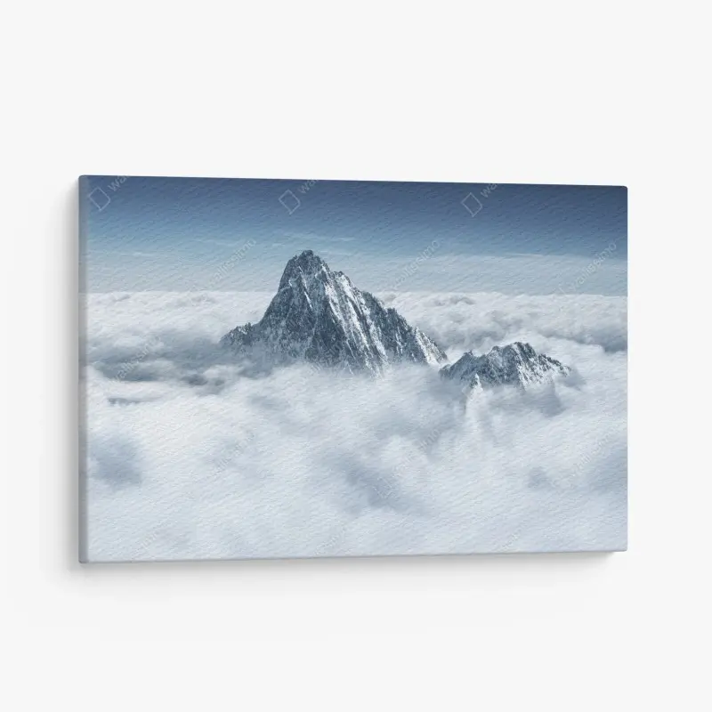 Canvas print snowy peaks above the clouds