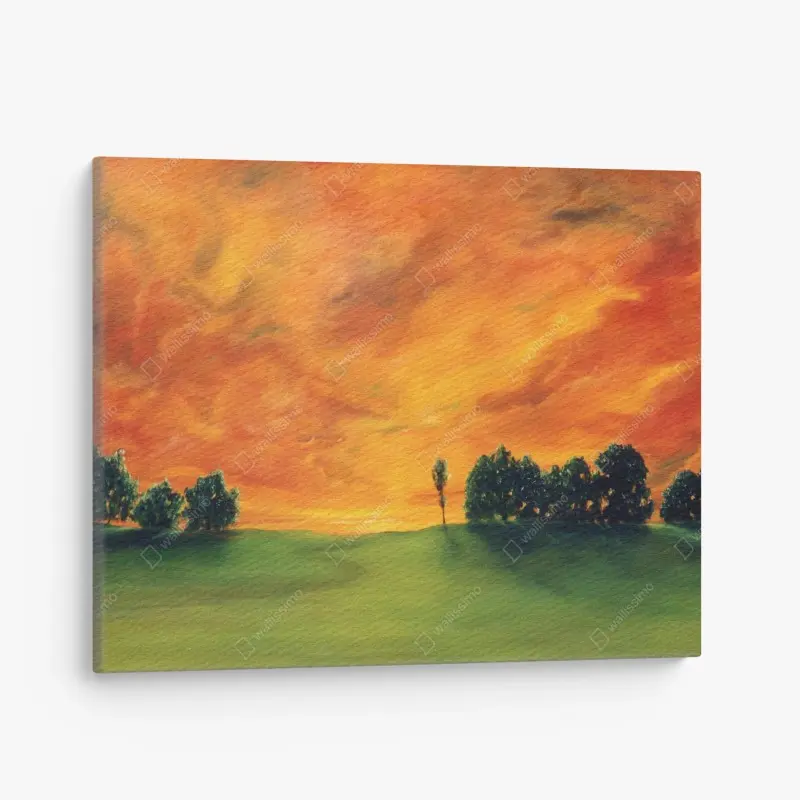 Canvas print fiery sunset over green meadow