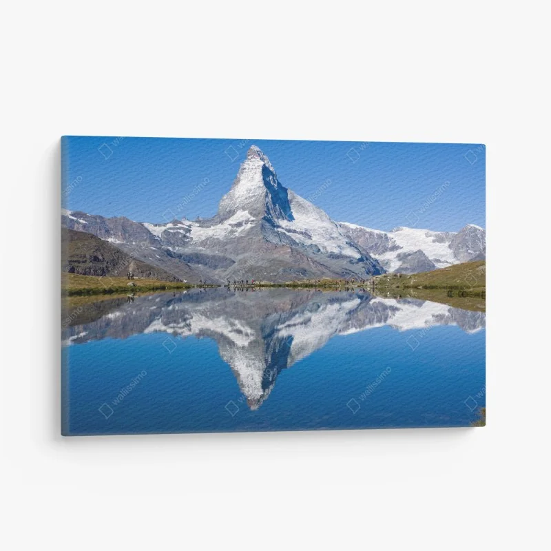Canvas print alpine peak reflected in a tranquil lake